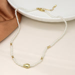 Cadwen Perlau | Ivory Seed Pearl and Gold Bead Necklace