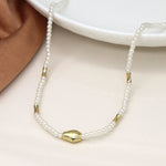 Cadwen Perlau | Ivory Seed Pearl and Gold Bead Necklace