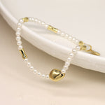 Breichled Perlau | Ivory Seed Pearl and Gold Bead Bracelet