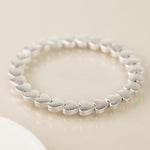 Breichled Calonnau Arian | Silver Plated Worn Hearts Bracelet