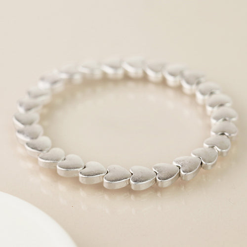 Breichled Calonnau Arian | Silver Plated Worn Hearts Bracelet