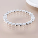 Breichled Calonnau Arian | Silver Plated Polished Hearts Bracelet