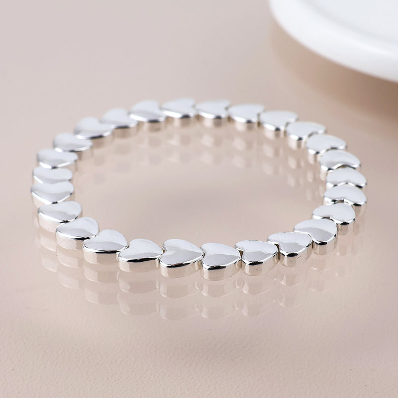 Breichled Calonnau Arian | Silver Plated Polished Hearts Bracelet