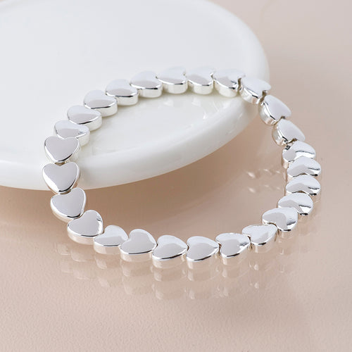 Breichled Calonnau Arian | Silver Plated Polished Hearts Bracelet