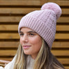 Dusky pink recycled herringbone bobble hat