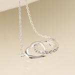 Cadwen Arian - Calon a Chylchyn | Silver Necklace - Linked Heart & Hoop