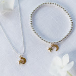 Cadwen Lleuad a Sêr Plentyn - Aur | Moon & Stars Children’s Necklace – Gold