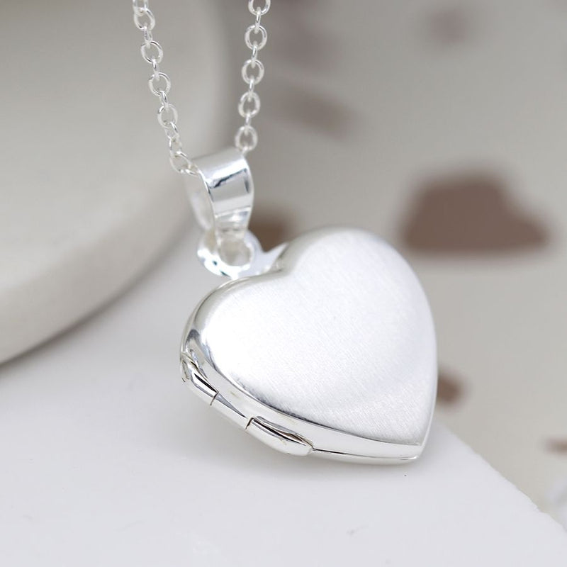 Silver heart hotsell shaped locket