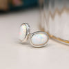 Clustdlysau Styd Arian | Sterling Silver Stud Earrings - Oval White Opal